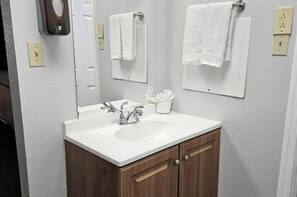 Room, 2 Queen Beds, Non Smoking | Bathroom | Combined shower/tub, hair dryer, towels