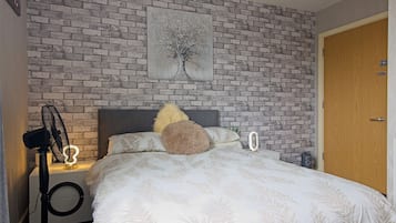 Apartamento | 2 quartos, Wi-Fi de cortesia, roupa de cama