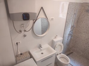 Dutxa, assecador de cabells i tovalloles