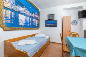 1 dormitorio, cuna de viaje, wifi gratis y ropa de cama