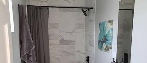 Hair dryer, towels, soap, shampoo