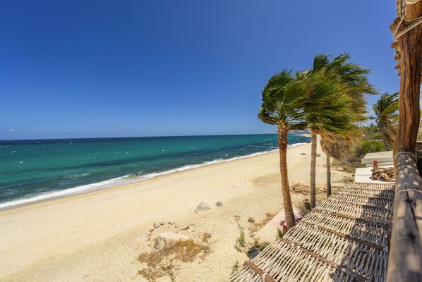 On the beach, sun-loungers, beach towels
