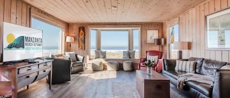 Televisión, chimenea, reproductor de DVD y futbolito