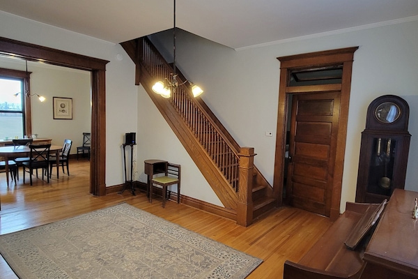 Foyer with piano and original details