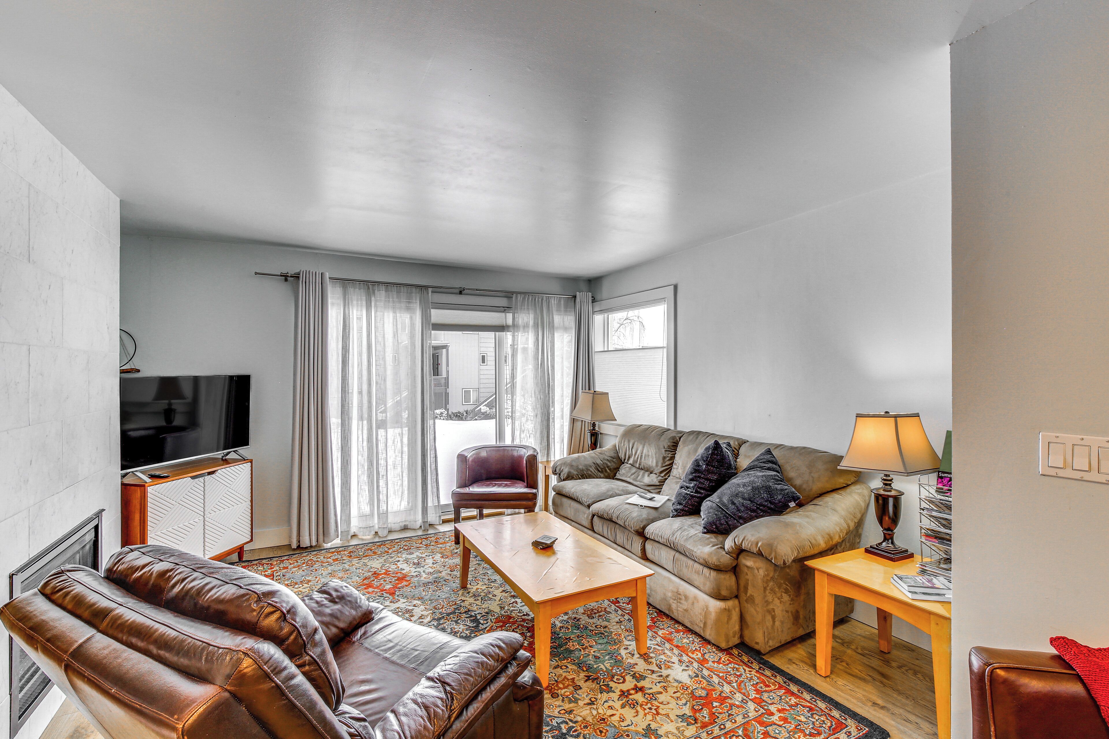 TV, fireplace, books