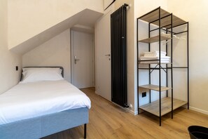 Habitació quàdruple bàsica | 1 dormitori i llençols italians de la marca Frette
