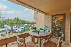 Outdoor dining - 7104 Harbourside 1 @ Shelter Cove | Pool | Stunning Marina Views (Hilton Head Island)