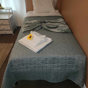 4 bedrooms, iron/ironing board, travel cot, WiFi