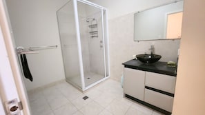 Shower, towels, soap, shampoo