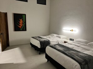 Chambre Deluxe | Literie hypoallergénique, couette en duvet d'oie