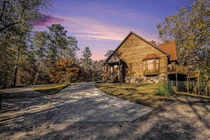 Exterior - Riverfront Cabin w/ Hot Tub & Outdoor Movie Screen. Quiet Retreat In The Woods! (Douglasville)