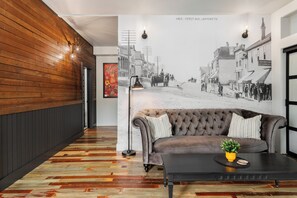 Suite, 1 Queen Bed | Living area | Fireplace - Temperance Hotel (Ladysmith)