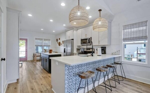 Fridge, microwave, oven, stovetop - "Dolphin Cove" is a 3 Bedroom, 2 Bathroom Woodlands Home! (Oak Island)