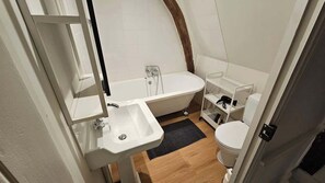 Shower, hair dryer, towels, shampoo