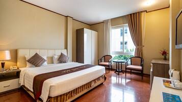 Standard Queen Room | Premium bedding, minibar, desk, blackout curtains