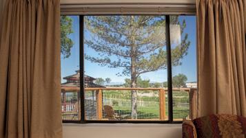 Signature Room, 1 King Bed, Private Bathroom, River View | Blackout drapes, iron/ironing board, free WiFi, bed sheets