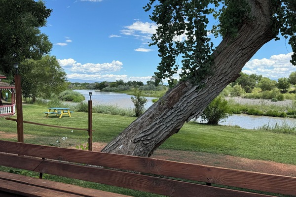 Apartment, 2 Bedrooms, River View | Blackout drapes, iron/ironing board, WiFi (free), bed sheets