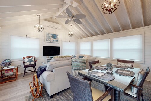 Ideally located home with yard, grill, bikes, gas fireplace, streaming, W/D, AC