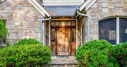 Lovely lakefront estate with boathouse, pickleball, firepit, & stunning view
