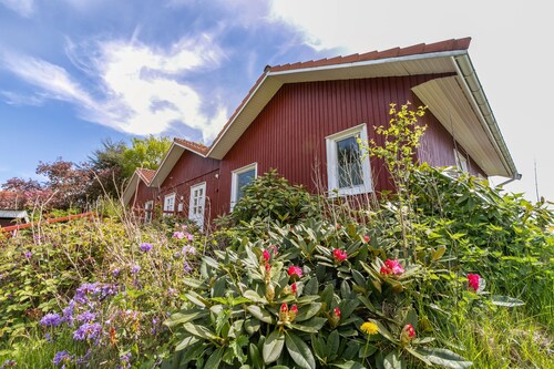 Ferienwohnung "Erika"im schwedischen Stil mit großen Garten und Nähe zu Ostsee und Schlei