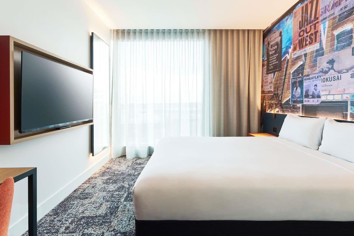 Habitación superior, 1 cama Queen size | Caja de seguridad en la habitación y escritorio