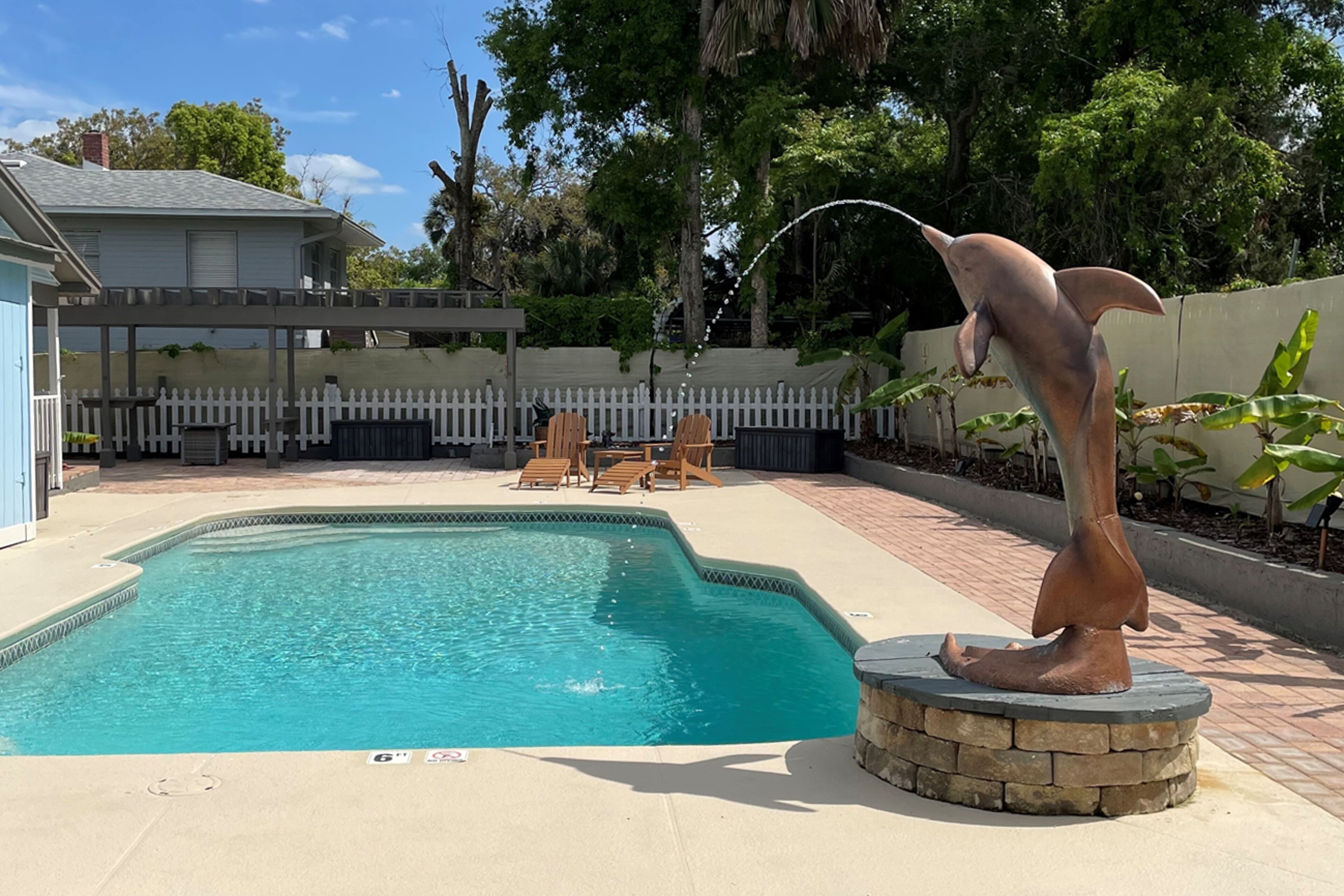 Historic dog-friendly home with luxury design, centralized location, & amenities