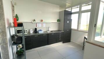 Fridge, microwave, coffee/tea maker, electric kettle