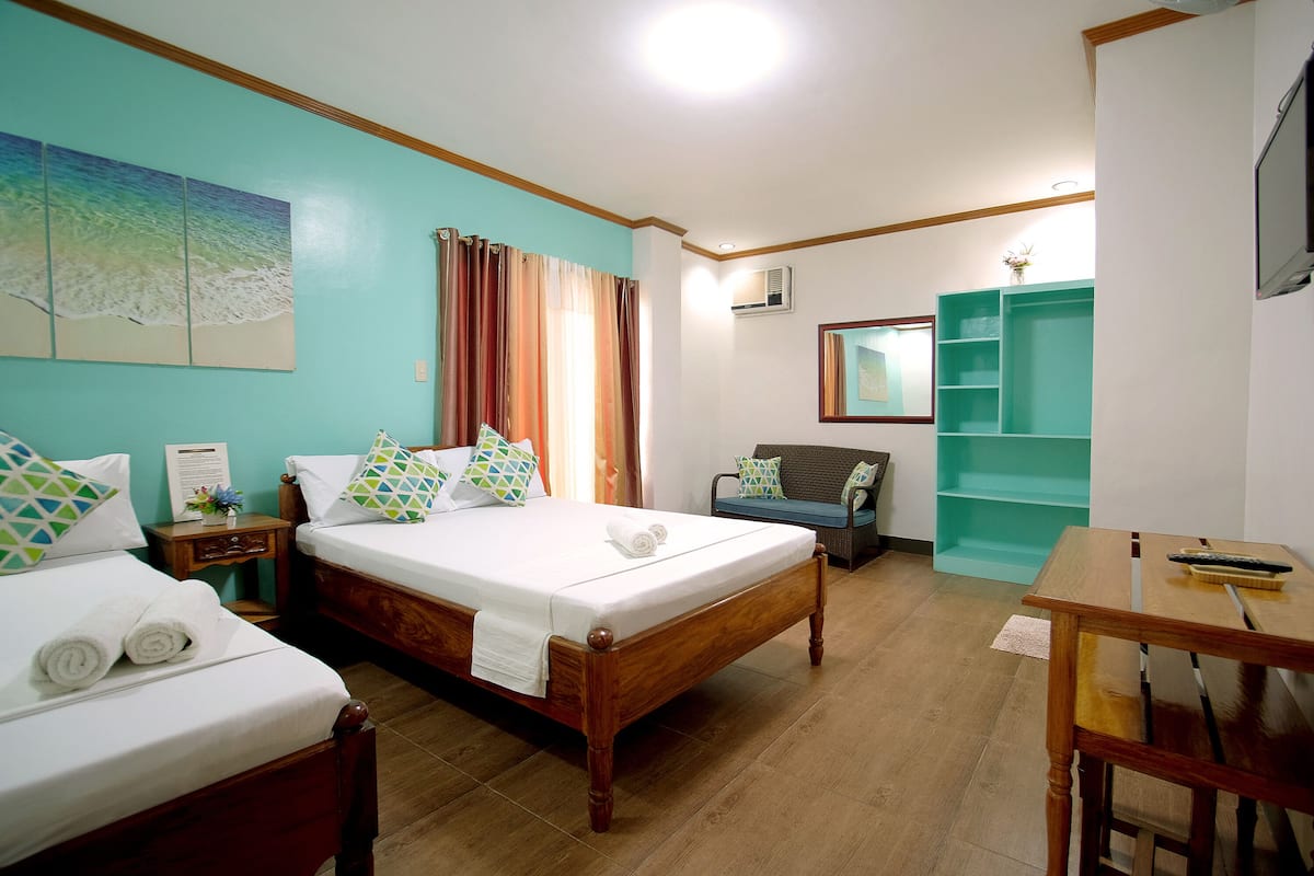 Habitación cuádruple | Ropa de cama