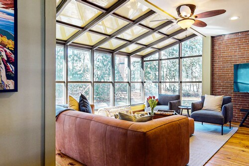 Elegant Victorian Gothic Revival home with wet bar, sunroom, & washer/dryer