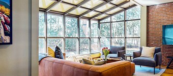 Elegant Victorian Gothic Revival home with wet bar, sunroom, & washer/dryer