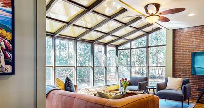 Elegant Victorian Gothic Revival home with wet bar, sunroom, & washer/dryer