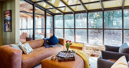 Elegant Victorian Gothic Revival home with wet bar, sunroom, & washer/dryer