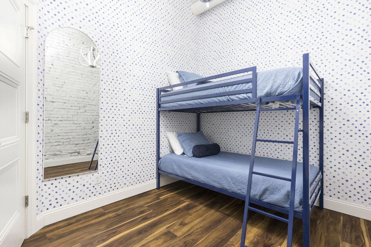 4 bedrooms, desk, iron/ironing board, travel cot