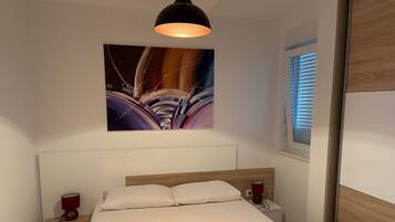 1 chambre, fer et planche Ă repasser, Wi-Fi gratuit, draps fournis
