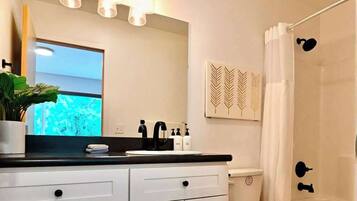 Shower, hair dryer, towels