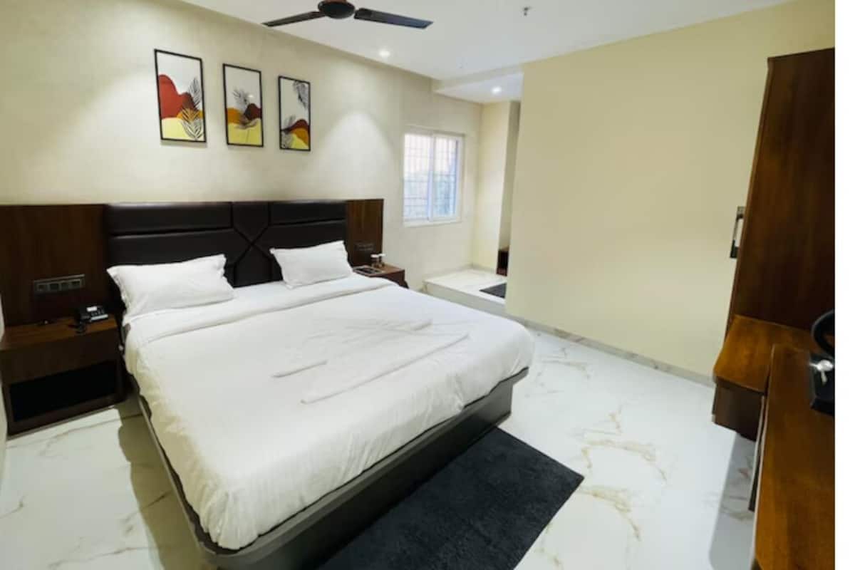 Premium bedding, desk, laptop workspace, bed sheets