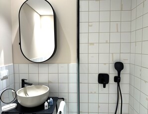 Hair dryer, towels, soap, shampoo