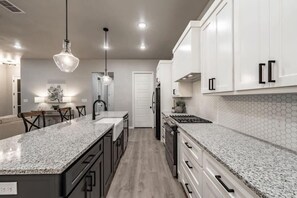 Fridge, microwave, oven, stovetop - Modern Uptown - 4BR 2BA - New Construction (Lubbock)