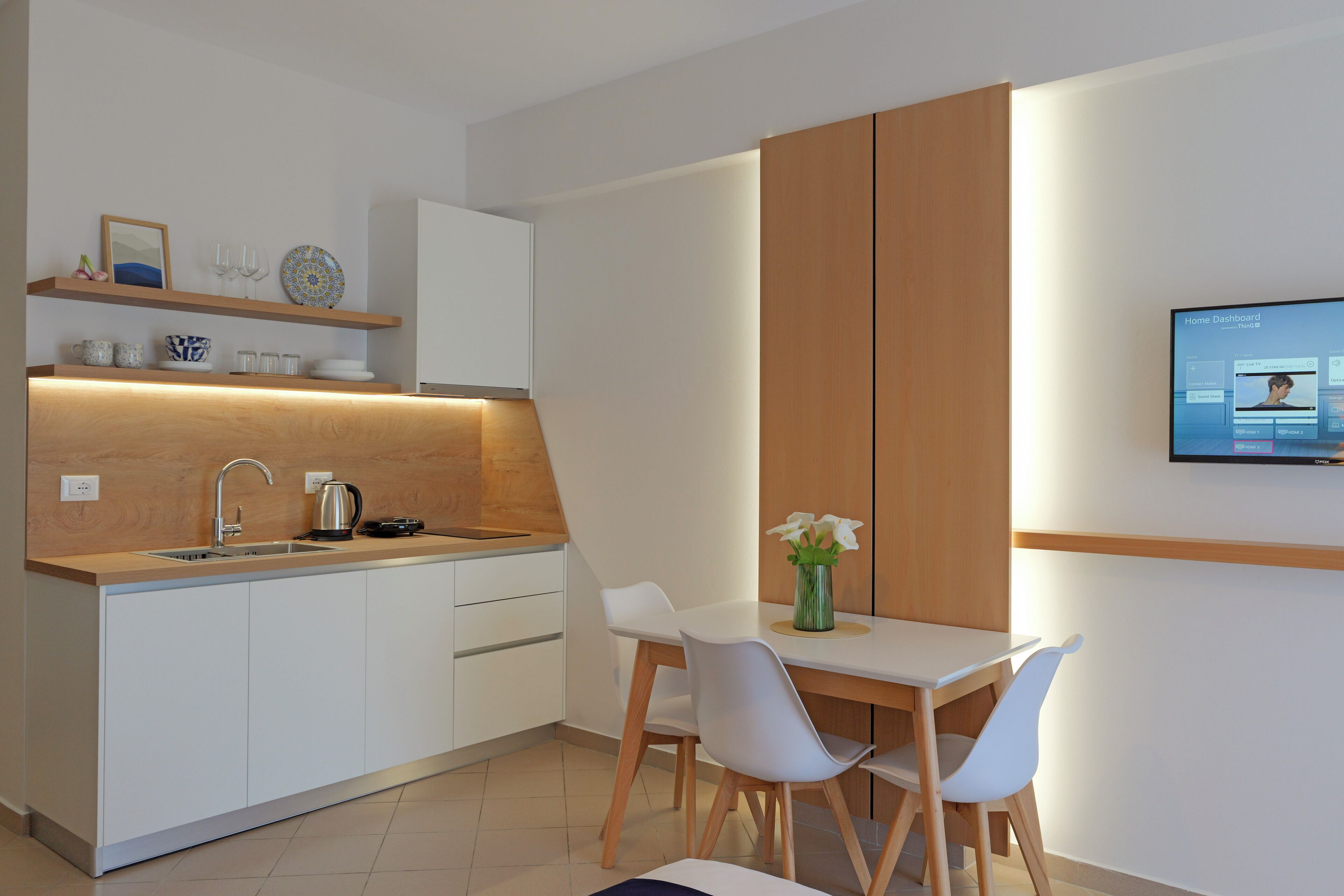 Departamento, vista al mar | Cocina privada | Refrigerador, parrilla de estufa, tostadora y utensilios de cocina 