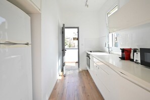 Fridge, microwave, oven, stovetop - 1BR near the beach w/ Balcony and Mamad by HolyGuest (Tel Aviv)