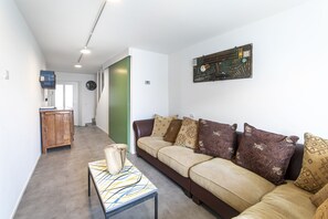 Apartment | Living room - La Casa del Pescatore (Colonno)