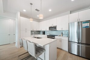 Fridge, microwave, oven, stovetop - The Harbor at Town Center #510 (Madeira Beach)