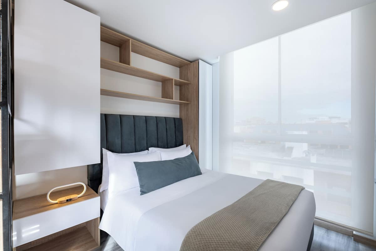 Panoramic Apartment | 1 bedroom, premium bedding, down comforters, in-room safe