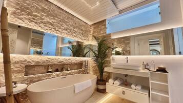 Deluxe Villa, 2 Bedrooms, Poolside | Bathroom | Eco-friendly toiletries, hair dryer, bathrobes, slippers