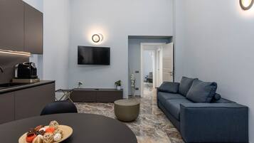 Appartamento Superga | Area soggiorno | TV 45 pollici con canali satellitari