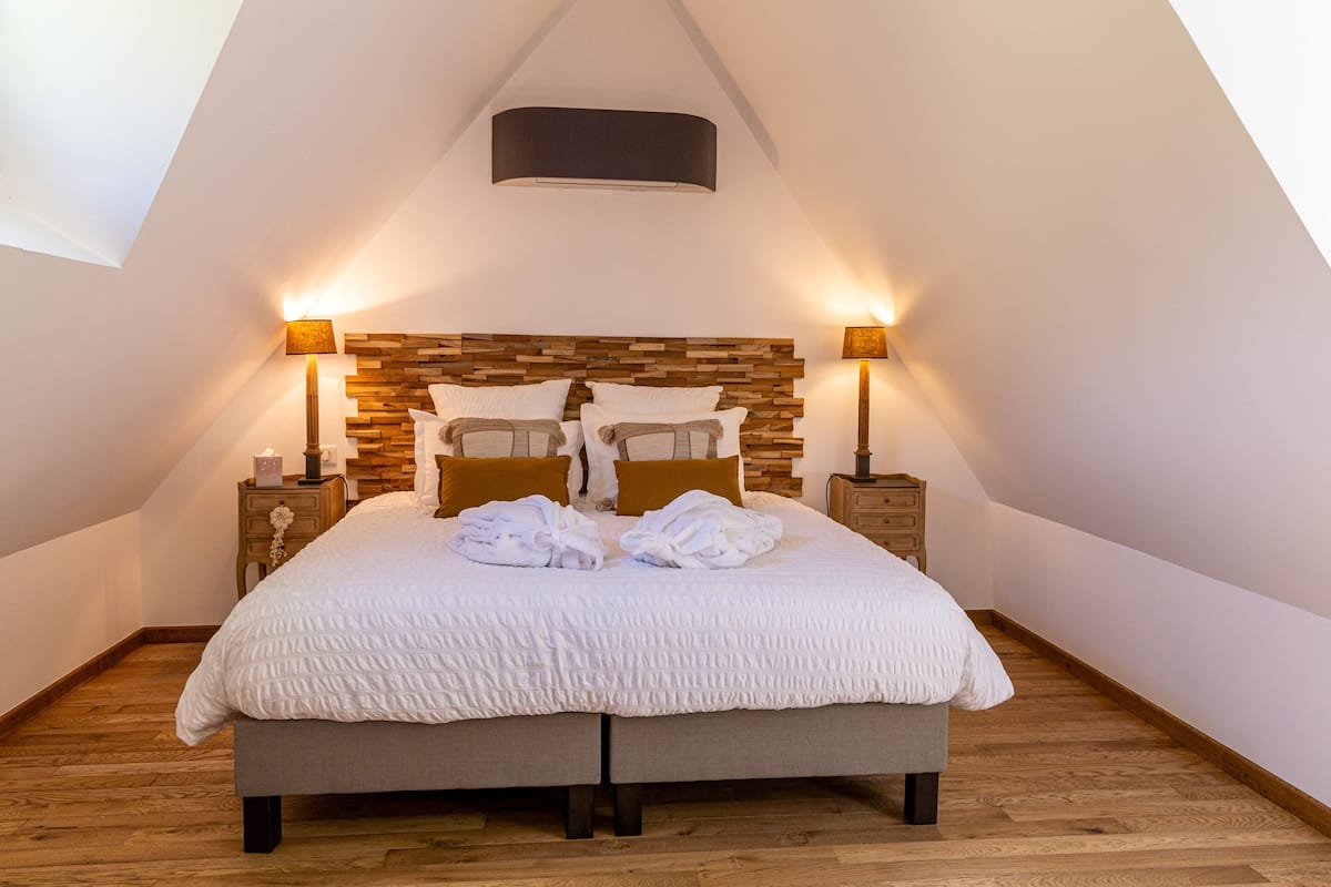 Deluxe Duplex, Private Bathroom, Garden View (PMR - Chambre Gabriel) | 1 bedroom, blackout drapes, iron/ironing board, free WiFi