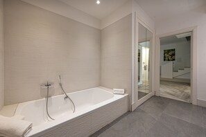 Shower, bidet, towels, soap