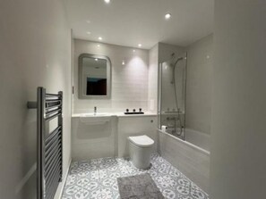 Hair dryer, towels, soap, shampoo