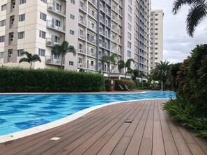 Outdoor pool - Cozy 1 bedroom by the mall with Netflix

 (Las Piñas)