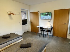 Apartamento, 2 camas individuales | 1 dormitorio, cortinas opacas, sistema de insonorización